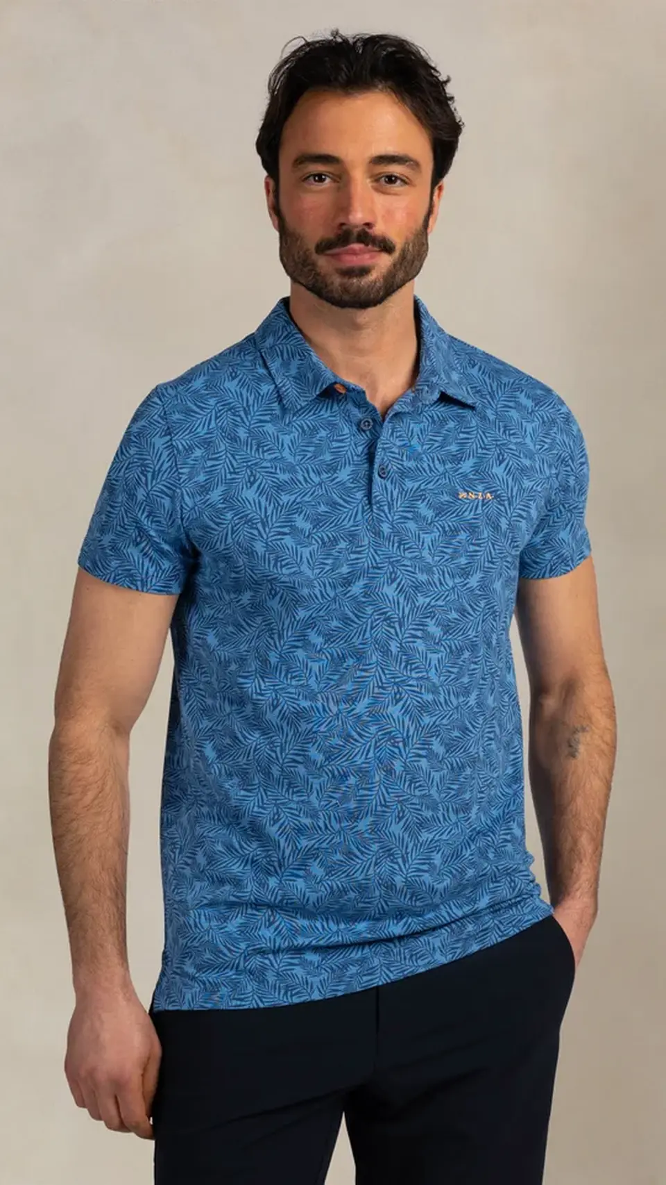 Polo de hombre sport con estampado de hojas