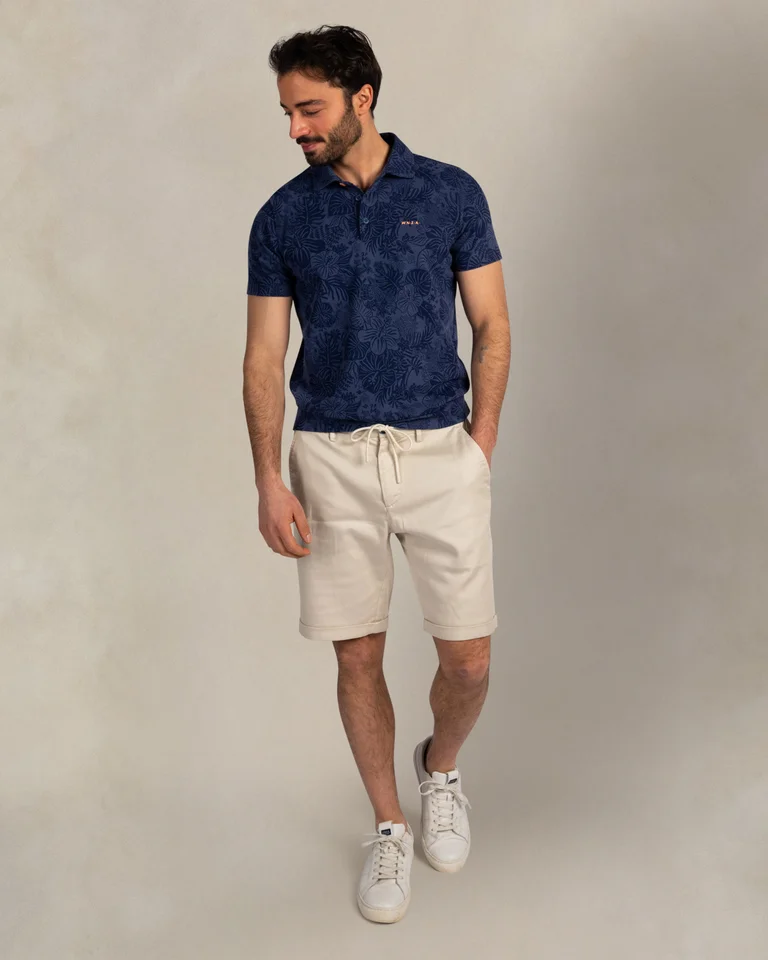 Polo de hombre con estampado de hojas y flores sport
