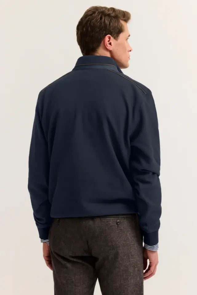 Jersey de punto con cremallera y detalle de piel Marca Bugatti