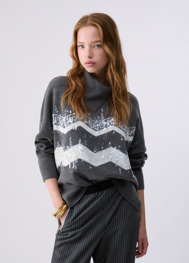 Jersey con cenefa de paillettes 