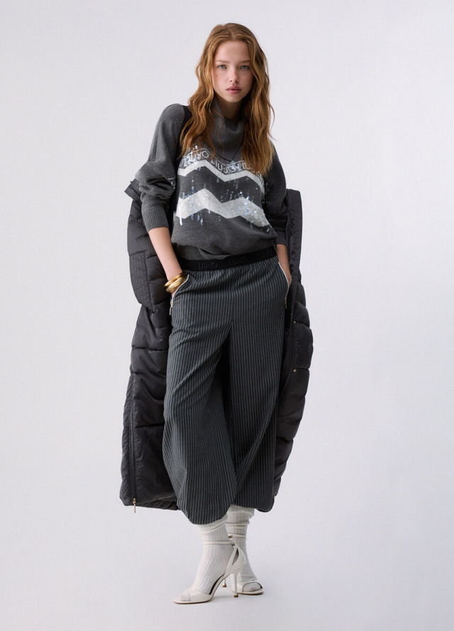 Jersey con cenefa de paillettes 