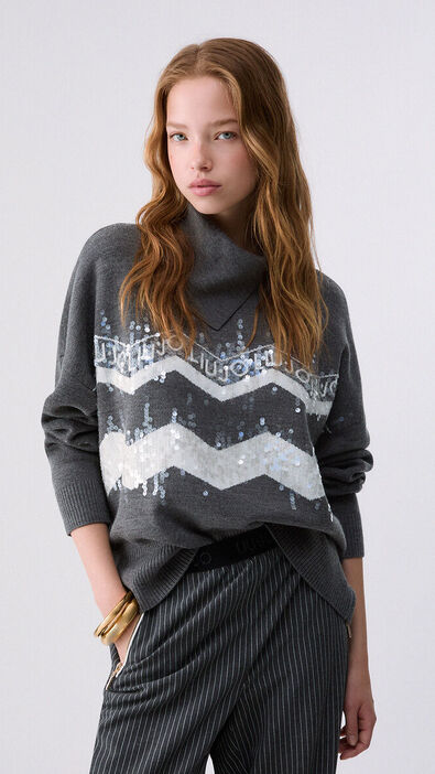Jersey con cenefa de paillettes 